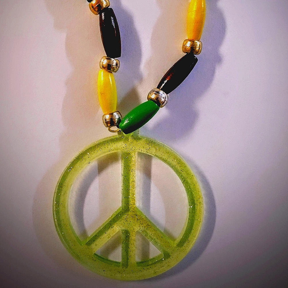 Green Peace..sign with multi colored wood beads necklace